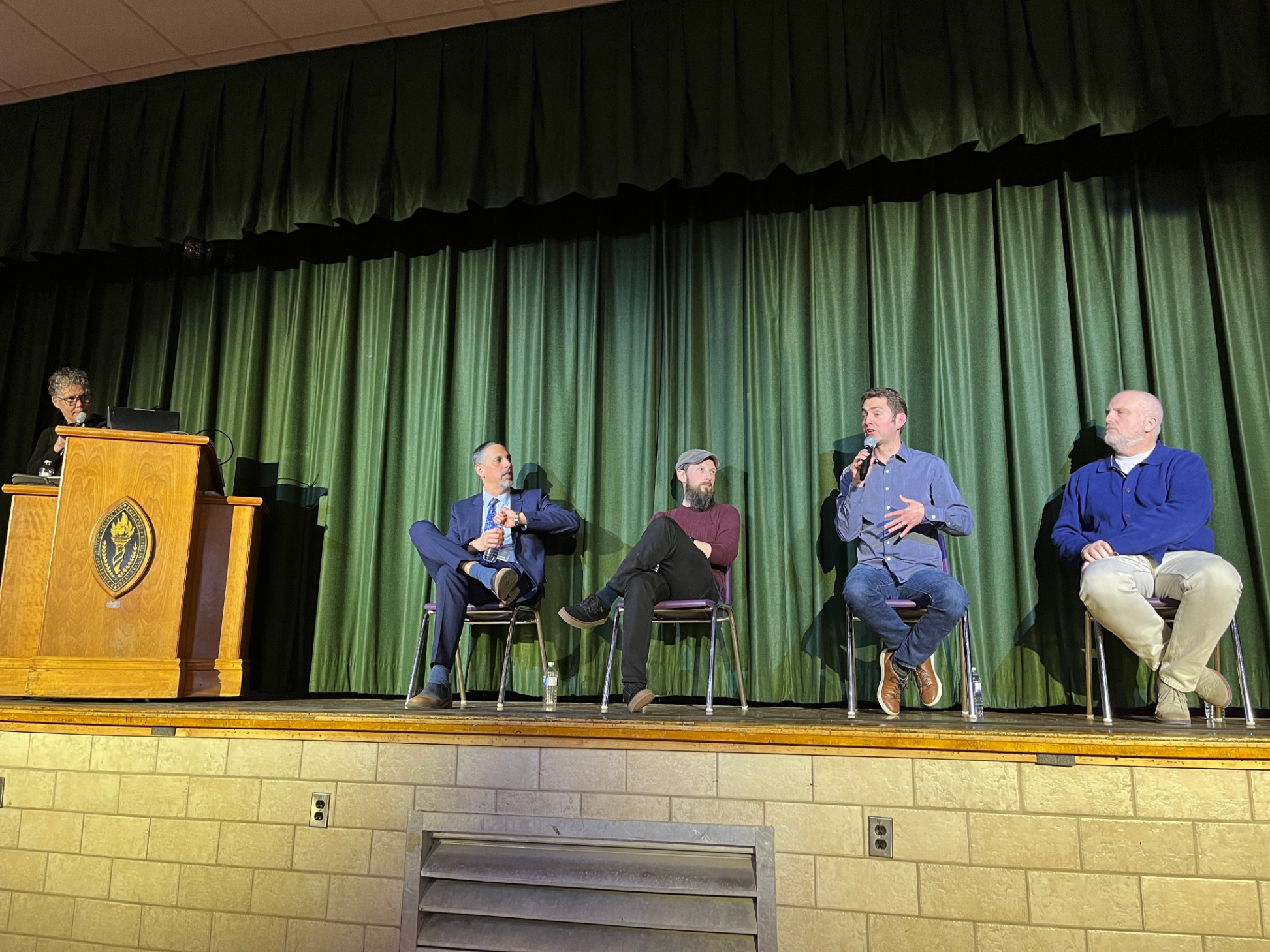 LDSB AI Night speaking panel on a stage