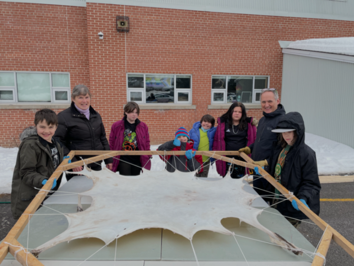 Stretching our deer hides with Kokum Deb